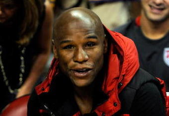 LAS VEGAS - OCTOBER 15:  Boxer Floyd Mayweather Jr. watches the preseason game between the Los Angeles Lakers and the Sacramento Kings at the Thomas & Mack Center October 15, 2009 in Las Vegas, Nevada. NOTE TO USER: User expressly acknowledges and agrees that, by downloading and/or using this Photograph, user is consenting to the terms and conditions of the Getty Images License Agreement.  (Photo by Ethan Miller/Getty Images)