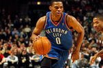 CHICAGO - JANUARY 04: Russell Westbrook #0 of the Oklahoma City Thunder moves the ball against the Chicago Bulls at the United Center on January 4, 2010 in Chicago, Illinois. The Thunder defeated the Bulls 98-85. NOTE TO USER: User expressly acknowledges and agrees that, by downloading and/or using this Photograph, User is consenting to the terms and conditions of the Getty Images License Agreement.  (Photo by Jonathan Daniel/Getty Images)