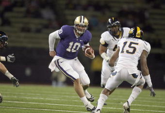 SEATTLE - DECEMBER 05:  Quarterback Jake Locker #10 of the Washington Huskies runs the ball during game against the California Bears on December 5, 2009 at Husky Stadium in Seattle, Washington. The Huskies defeated the Bears 42-10. (Photo by Otto Greule Jr/Getty Images)