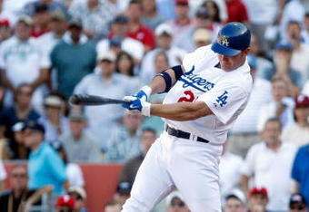 LOS ANGELES, CA - OCTOBER 16:  Jim Thome #25 of the Los Angeles Dodgers hits a single in the eighth inning against the Philadelphia Phillies in Game Two of the NLCS during the 2009 MLB Playoffs at Dodger Stadium on October 16, 2009 in Los Angeles, California.  (Photo by Jeff Gross/Getty Images)