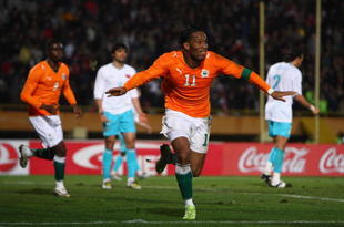 IZMIR, TURKEY - FEBRUARY 11:  Didier Drogba celebrates his goal for the Ivory Coast during the International Friendly match between Turkey and the Ivory Coast at the Izmir Ataturk Stadium on February 11, 2009 in Izmir, Turkey.  (Photo by Jamie McDonald/Getty Images)