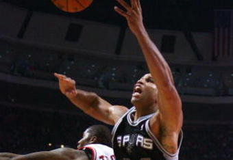 CHICAGO - OCTOBER 29: Richard Jefferson #24 of the San Antonio Spurs knocks a loose ball out of bounds past Tyrus Thomas #24 of the Chicago Bulls at the United Center on October 29, 2009 in Chicago, Illinois. NOTE TO USER: User expressly acknowledges and agrees that, by downloading and/or using this Photograph, user is consenting to the terms and conditions of the Getty Images License Agreement. (Photo by Jonathan Daniel/Getty Images)