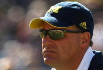 ANN ARBOR, MI - SEPTEMBER 19:  Head coach Rich Rodriguez of the Michigan Wolverines watches warmups before the game with the Eastern Michigan Eagles at Michigan Stadium on September 19, 2009 in Ann Arbor, Michigan.  Michigan won 45-17.  (Photo by Stephen Dunn/Getty Images)