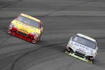 FONTANA, CA - FEBRUARY 21:  Kevin Harvick, driver of the #29 Shell Pennzoil Chevrolet, takes a turn alongside Jimmie Johnson, driver of the #48 Lowe's/Kobalt Tools Chevrolet, during the NASCAR Sprint Cup Series Auto Club 500 at Auto Club Speedway on February 21, 2010 in Fontana, California.  (Photo by Jeff Gross/Getty Images)