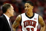 LAS VEGAS - FEBRUARY 20:  Head coach Lon Kruger of the UNLV Rebels talks to Tre'Von Willis #33 during the team's 70-39 victory over the Colorado State Rams at the Thomas & Mack Center February 20, 2010 in Las Vegas, Nevada.  (Photo by Ethan Miller/Getty Images)