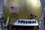 22 Sep 2001: An American flag adorns the helmuts of Notre Dame players when Notre Dame takes on Michigan State at South Bend, Indiana. DIGITAL IMAGE  Mandatory Credit: Jonathan Daniel/ALLSPORT