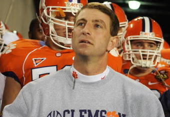TAMPA, FL - NOVEMBER 28: Coach Dabo Swinney of the Clemson Tigers checks the scoreboard before play against the Georgia Tech Yellow Jackets in the 2009 ACC Football Championship Game December 5, 2009 at Raymond James Stadium in Tampa, Florida.  (Photo by Al Messerschmidt/Getty Images) 