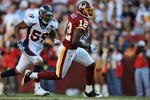 LANDOVER, MD - NOVEMBER 15:  Malcolm Kelly #12 of the Washington Redskins runs the ball against the Denver Broncos at FedExField on November 15, 2009 in Landover, Maryland. The Redskins defeated the Broncos 27-17. (Photo by Larry French/Getty Images)