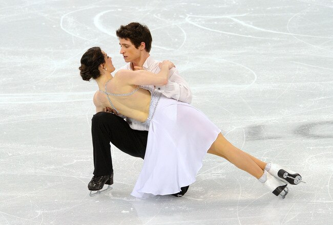 VANCOUVER, BC - FEBRUARY 22:  Tessa Virtue and Scott Moir of Canada compete in the free dance portion of the Ice Dance competition on day 11 of the 2010 Vancouver Winter Olympics at Pacific Coliseum on February 22, 2010 in Vancouver, Canada.  (Photo by Kevork Djansezian/Getty Images)