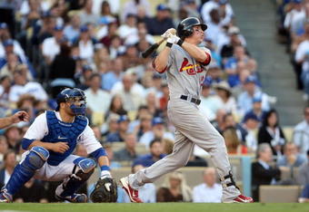 LOS ANGELES, CA - OCTOBER 08:  Colby Rasmus #28 of the St. Louis Cardinals hits a RBI double in the seventh inning against the Los Angeles Dodgers in Game Two of the NLDS during the 2009 MLB Playoffs at Dodger Stadium on October 8, 2009 in Los Angeles, California.  (Photo by Stephen Dunn/Getty Images)