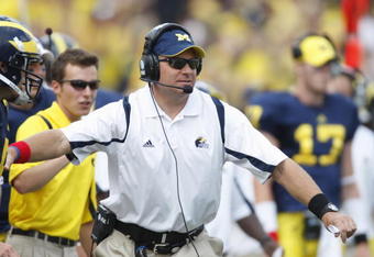 ANN ARBOR, MI - SEPTEMBER 5:  Head coach Rich Rodriguez of the Michigan Wolverines looks on during the game against the Western Michigan Broncos on September 5, 2009 at Michigan Stadium in Ann Arbor, Michigan. (Photo by Gregory Shamus/Getty Images) 