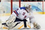 VANCOUVER, BC - FEBRUARY 21:  Goalkeeper Ryan Miller #39 of the United States makes a save during the ice hockey men's preliminary game between Canada and USA on day 10 of the Vancouver 2010 Winter Olympics at Canada Hockey Place on February 21, 2010 in Vancouver, Canada.  (Photo by Harry How/Getty Images)