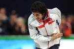 VANCOUVER, BC - FEBRUARY 23:  Lee Seung-Hoon of South Korea celebrates gold during the flower ceremony for the men's 10000 m speed skating on day 12 of the 2010 Vancouver Winter Olympics at Richmond Olympic Oval on February 23, 2010 in Vancouver, Canada.  (Photo by Jasper Juinen/Getty Images)