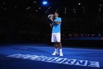 MELBOURNE, AUSTRALIA - JANUARY 31:  Roger Federer of Switzerland holds aloft the Norman Brookes Challenge Cup after his men's final match against Andy Murray of Great Britain during day fourteen of the 2010 Australian Open at Melbourne Park on January 31, 2010 in Melbourne, Australia.  (Photo by Mark Dadswell/Getty Images)