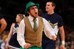 NEW YORK - MARCH 11: Tthe Notre Dame Fighting Irish mascot cheers on the court during a game against the West Virginia Mountaineers during the second round of the Big East Tournament at Madison Square Garden on March 11, 2009 in New York City.  (Photo by Jim McIsaac/Getty Images)