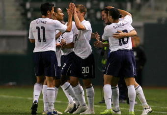 CARSON, CA - JANUARY 24:  Sacha Kljestan #16 of the USA celebrates his first of three goals against Sweden with Charlie Davies #10 and other teammates near the bench area in the first half during their international friendly match at The Home Depot Center on January 24, 2009 in Carson, California. USA defeated Sweden 3-2.  (Photo by Victor Decolongon/Getty Images)
