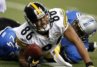 DETROIT , MI - OCTOBER 11:  Hines Ward #86 of the Pittsburgh Steelers reacts after scoring a quarter touchdown while playing the Detroit Lions on October 11, 2009 at Ford Field in Detroit, Michigan.  (Photo by Gregory Shamus/Getty Images)