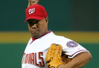 WASHINGTON - APRIL 24:  Starting pitcher Livan Hernandez #61 of the Washington Nationals throws against the Cincinnati Reds April 24, 2006 at RFK Stadium in Washington, DC.  (Photo by Jamie Squire/Getty Images)