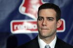 BOSTON - DECEMBER 14:  Red Sox general manager Theo Epstein pauses before he addresses the media during a press conference announcing that the pitcher Daisuke Matsuzaka has signed with the Boston Red Sox on December 14, 2006 at Fenway Park in Boston, Massachusetts. Matsuzaka will earn $52 million over six years.  (Photo by Elsa/Getty Images)