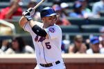 NEW YORK - JULY 12:  David Wright #5 of the New York Mets bats against the Cincinnati Reds on July 12, 2009 at Citi Field in the Flushing neighborhood of the Queens borough of New York City.  (Photo by Jim McIsaac/Getty Images)