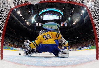 VANCOUVER, BC - FEBRUARY 21:  Henrik Lundqvist of Sweden makes a save against Finland during the ice hockey men's preliminary game between Sweden and Finland on day 10 of the Vancouver 2010 Winter Olympics at Canada Hockey Place on February 21, 2010 in Vancouver, Canada.  (Photo by Jamie Squire REMOTE/Getty Images)