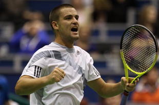 ROTTERDAM, NETHERLANDS - FEBRUARY 13:  Mikhail Youzhny of Russia celebrates defeating Novak Djokovic of Serbia during day six of the ABN AMBRO World Tennis Tournament on February 13, 2010 in Rotterdam, Netherlands.  (Photo by Julian Finney/Getty Images)