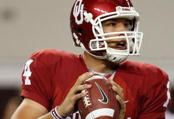 ARLINGTON, TX - SEPTEMBER 05:  Quarterback Sam Bradford #14 of the Oklahoma Sooners drops back to pass against the Brigham Young Cougars at Cowboys Stadium on September 5, 2009 in Arlington, Texas.  (Photo by Ronald Martinez/Getty Images)