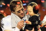 MIAMI GARDENS, FL - FEBRUARY 07:  Drew Brees #9 of the New Orleans Saints celebrates with his son Baylen Brees after defeating the Indianapolis Colts during Super Bowl XLIV on February 7, 2010 at Sun Life Stadium in Miami Gardens, Florida.  (Photo by Ronald Martinez/Getty Images)