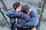 SEATTLE - SEPTEMBER 18:  Ichiro Suzuki #51 (L) of the Seattle Mariners gets a hug from Ken Griffey Jr. #24 after batting practice prior to the game against the New York Yankees on September 18, 2009 at Safeco Field in Seattle, Washington. (Photo by Otto Greule Jr/Getty Images)