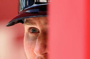 PHOENIX - APRIL 15:  Khalil Greene #42 of the St. Louis Cardinals waits to bat in the dugout during the game against the Arizona Diamondbacks at Chase Field on April 15, 2009 in Phoenix, Arizona. The Cardinals defeated the Diamondbacks 12-7.(Photo by Christian Petersen/Getty Images)