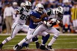 INDIANAPOLIS - JANUARY 24:  Wide receiver Braylon Edwards #17 of the New York Jets is tackled by Kelvin Hayden #26 of the Indianapolis Colts during the AFC Championship Game at Lucas Oil Stadium on January 24, 2010 in Indianapolis, Indiana.  (Photo by Jonathan Daniel/Getty Images)