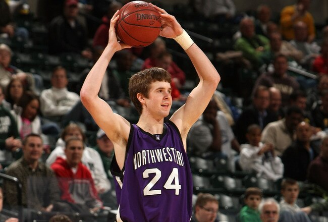 INDIANAPOLIS - MARCH 12:  John Shurna #24 of the Northwestern Wildcats looks to pass the ball against the Minnesota Golden Gophers during the first round of the Big Ten Men's Basketball Tournament at Conseco Fieldhouse on March 12, 2009 in Indianapolis, Indiana.  (Photo by Jonathan Daniel/Getty Images)