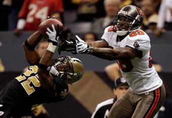 NEW ORLEANS - DECEMBER 27:  Cornerback Tracy Porter #22 of the New Orleans Saints intercepts a pass in the end-zone intended for Antonio Bryant #89 of the Tampa Bay Buccaneers during the game on December 27, 2009 at Louisiana Superdome in New Orleans, Louisiana.  (Photo by Jamie Squire/Getty Images)