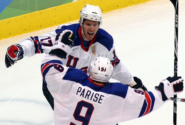 VANCOUVER, BC - FEBRUARY 21:  Zach Parise #9 of the United States and Ryan Kesler #17 of the United States celebrate after Kesler scored an empty net goal in the third period during the ice hockey men's preliminary game between Canada and USA on day 10 of the Vancouver 2010 Winter Olympics at Canada Hockey Place on February 21, 2010 in Vancouver, Canada. Team USA won 5-3.  (Photo by Alex Livesey/Getty Images)