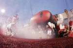 FAYETTEVILLE, AR - SEPTEMBER 2:  Players of the Arkansas Razorbacks take the field before the game against the University of Southern California Trojans on September 2, 2006 at Donald W. Reynolds Razorback Stadium in Fayetteville, Arkansas.  Southern California won 50-14.  (Photo by Brian Bahr/Getty Images)