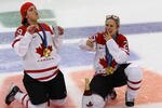 VANCOUVER, BC - FEBRUARY 25:  (L to R) Marie-Philip Poulin #29 and Tessa Bonhomme #25 of Canada celebrate winning the gold medal with a beer and a cigar following their team's 2-0 victory during the ice hockey women's gold medal game between Canada and USA on day 14 of the Vancouver 2010 Winter Olympics at Canada Hockey Place on February 25, 2010 in Vancouver, Canada.  (Photo by Alex Livesey/Getty Images)