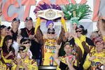 LAS VEGAS - MARCH 01:  Kyle Busch, driver of the #18 M&M's Toyota, celebrates in Victory Lane after winning the NASCAR Sprint Cup Series Shelby 427 at the Las Vegas Motor Speedway on March 1, 2009 in Las Vegas, Nevada.  (Photo by Rusty Jarrett/Getty Images for NASCAR)