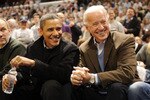 WASHINGTON - JANUARY 30:  President of the United States Barack Obama and Vice President Joe Biden talk during a college basketball game between Georgetown Hoyas and the Duke Blue Devils on January 30, 2010 at the Verizon Center in Washington DC.  (Photo by Mitchell Layton/Getty Images)