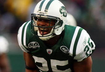 EAST RUTHERFORD, NJ - OCTOBER 18:  Kerry Rhodes #25 of the New York Jets celebrates a sack against the Buffalo Bills at Giants Stadium in the Meadowlands on October 18, 2009 in East Rutherford, New Jersey.  (Photo by Mike Stobe/Getty Images)