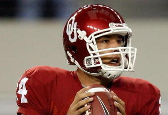 ARLINGTON, TX - SEPTEMBER 05:  Quarterback Sam Bradford #14 of the Oklahoma Sooners drops back to pass against the Brigham Young Cougars at Cowboys Stadium on September 5, 2009 in Arlington, Texas.  (Photo by Ronald Martinez/Getty Images)