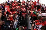 VANCOUVER, BC - FEBRUARY 21:  (C from top) Martin Brodeur #30, Scott Niedermayer #27, Joe Thornton #19 and Jarome Iginla #12 of Canada taake the ice as fans cheer prior to playing the ice hockey men's preliminary game between Canada and USA on day 10 of the Vancouver 2010 Winter Olympics at Canada Hockey Place on February 21, 2010 in Vancouver, Canada.  (Photo by Bruce Bennett/Getty Images)