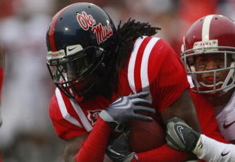OXFORD, MS - OCTOBER 10:  Wide Receiver Dexter McCluster #22 goes for extra yardage during their game against the Alabama Crimson Tide at Vaught-Hemingway Stadium on October 10, 2009 in Oxford, Mississippi. (Photo by Dave Martin/Getty Images)