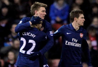 STOKE ON TRENT, ENGLAND - FEBRUARY 27:  Nicklas Bendtner (L) of Arsenal celebrates scoring his team's first goal with team mates Aaron Ramsey and Gael Clichy during the Barclays Premier League match between Stoke City and Arsenal at The Britannia Stadium on February 27, 2010 in Stoke on Trent, England.  (Photo by Laurence Griffiths/Getty Images)