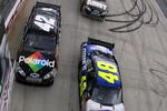 DOVER, DE - SEPTEMBER 27:  Jimmie Johnson (R), driver of the #48 Lowe's Chevrolet and Juan Pablo Montoya, driver of the #42 Polaroid Chevrolet lead the field at the start of the NASCAR Sprint Cup Series AAA 400 at Dover International Speedway on September 27, 2009 in Dover, Delaware.  (Photo by Chris Trotman/Getty Images)