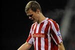 STOKE ON TRENT, ENGLAND - FEBRUARY 27:  Ryan Shawcross of Stoke City leaves the pitch in tears after being sent off for a challenge on Aaron Ramsey of Arsenal during the Barclays Premier League match between Stoke City and Arsenal at The Britannia Stadium on February 27, 2010 in Stoke on Trent, England.  (Photo by Laurence Griffiths/Getty Images)