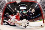 VANCOUVER, BC - FEBRUARY 28:  Zach Parise #9 of the United States celebrates after scoring a goal past Roberto Luongo #1 of Canada to tie the scores 2-2 late in the third during the ice hockey men's gold medal game between USA and Canada on day 17 of the Vancouver 2010 Winter Olympics at Canada Hockey Place on February 28, 2010 in Vancouver, Canada.  (Photo by Scott Audette - Pool/Getty Images)