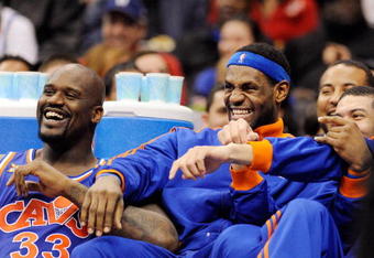 LOS ANGELES, CA - JANUARY 16:  LeBron James (C) #23 Shaquille O'Neal #33 (R) and Anthony Parker #18 of the Cleveland Caveliers make fun of their teammate Delonte West (not Shown) as he takes a foul shot against the Los Angeles Clippers during the first quarter of the NBA basketball game at Staples Center on January 16, 2010 in Los Angeles, California. NOTE TO USER: User expressly acknowledges and agrees that, by downloading and or using this photograph, User is consenting to the terms and conditions of the Getty Images License Agreement.  (Photo by Kevork Djansezian/Getty Images)