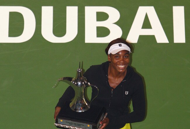 DUBAI, UNITED ARAB EMIRATES - FEBRUARY 20:  Venus Williams of the USA poses with her winners trophy after her final match against Victoria Azarenka of Belarus during day seven of the WTA Barclays Dubai Tennis Championships at the Dubai Tennis Stadium on February 20, 2010 in Dubai, United Arab Emirates.  (Photo by Ryan Pierse/Getty Images)