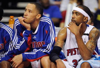 AUBURN HILLS, MI - APRIL 26:  (L-R) Tayshaun Prince #22 and Richard Hamilton #32 of the Detroit Pistons sit on the bench in Game Four of the Eastern Conference Quarterfinals against the Cleveland Cavaliers during the 2009 NBA Playoffs at the Palace of Auburn Hills on April 26, 2009 in Auburn Hills, Michigan.  The Cavaliers won 99-78.  NOTE TO USER: User expressly acknowledges and agrees that, by downloading and or using this photograph, User is consenting to the terms and conditions of the Getty Images License Agreement.  (Photo by Gregory Shamus/Getty Images)