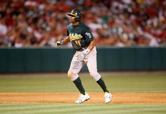ANAHEIM, CA - AUGUST 29:  Rajai Davis #11 of the Oakland Athletics leads off of second base against the Los Angeles Angels of Anaheim at Angel Stadium on August 29, 2009 in Anaheim, California.  (Photo by Jeff Gross/Getty Images)
